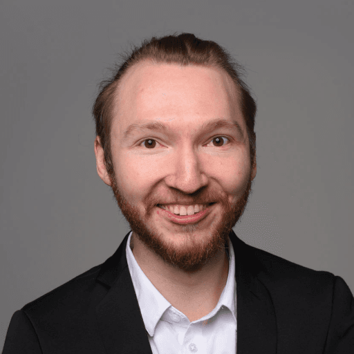 Porträt von Julien Scholz, Co-Founder & CTO bei Spargold